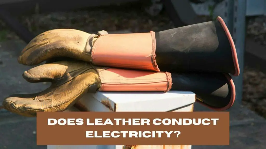 Photo of leather gloves with rubber on the inside to work with electricity. Does leather conduct electricity?