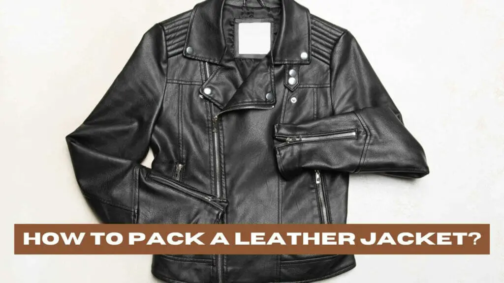 Photo of a black leather jacket with sleeves folded. How to Pack a Leather Jacket?