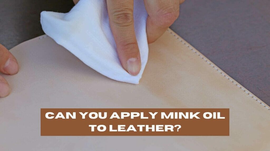 Photo of a person applying mink oil to leather. Mink oil on leather.